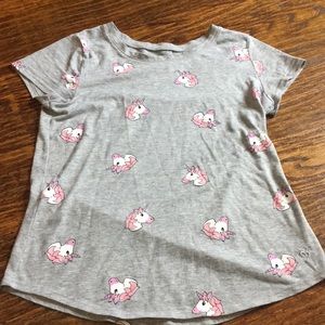 A grey short sleeve shirt with unicorns on size 14